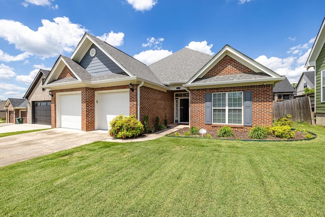 view of front of property featuring fence, concrete driveway, a front yard, brick siding, and roof with shingles