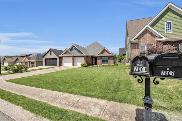 7861 Laurelton Dr, Chattanooga, TN 37421 - view of front of house with brick siding, a front lawn, concrete driveway, and a residential view