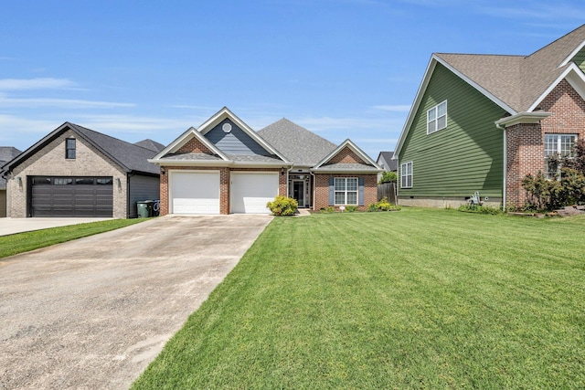 7861 Laurelton Dr, Chattanooga, TN 37421 - view of front of property with brick siding, a garage, driveway, and a front yard