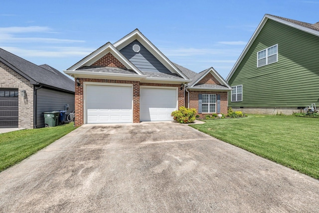 7861 Laurelton Dr, Chattanooga, TN 37421 - view of front of property with brick siding, driveway, a front lawn, and an attached garage