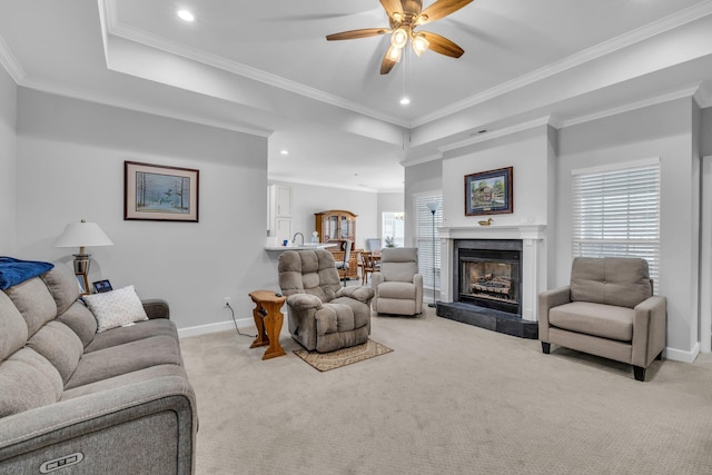 7861 Laurelton Dr, Chattanooga, TN 37421 - living area featuring light carpet, ceiling fan, baseboards, crown molding, and recessed lighting