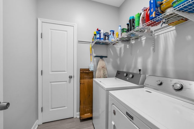 7861 Laurelton Dr, Chattanooga, TN 37421 - laundry room with washer and clothes dryer and light wood-style flooring