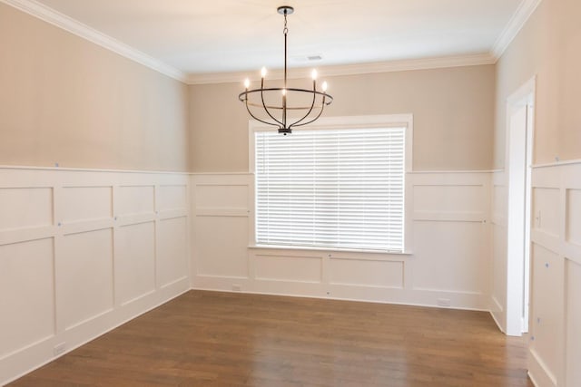 8880 Knolling Loop Unit 35, Ooltewah, TN 37363 - unfurnished dining area featuring a decorative wall, a chandelier, wood finished floors, ornamental molding, and wainscoting