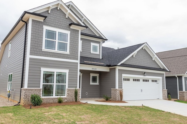 8880 Knolling Loop Unit 35, Ooltewah, TN 37363 - craftsman house with driveway, a front yard, a garage, and brick siding
