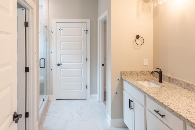 8880 Knolling Loop Unit 35, Ooltewah, TN 37363 - full bath featuring marble finish flooring, a shower stall, vanity, and baseboards