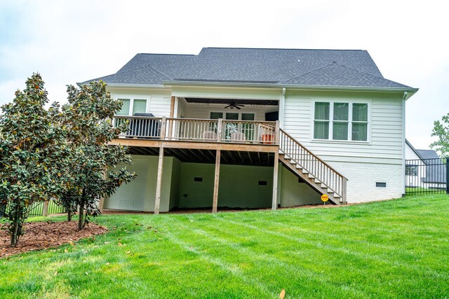 rear view of house with stairway, a wooden deck, ceiling fan, a garage, and roof with shingles