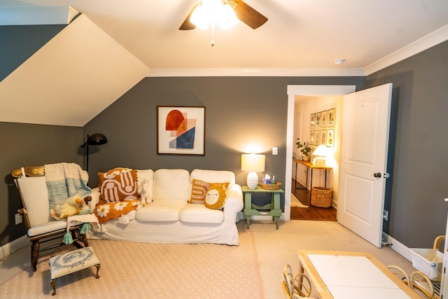living area with ceiling fan, carpet flooring, lofted ceiling, and baseboards