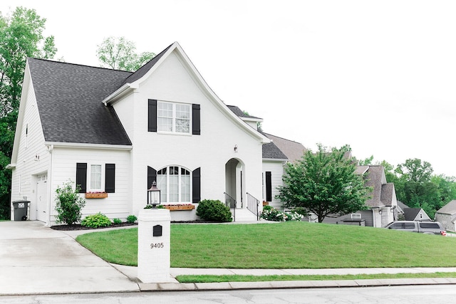 9405 Peppy Branch Trl, Apison, TN 37302 - view of front of property with driveway, a front yard, roof with shingles, and an attached garage