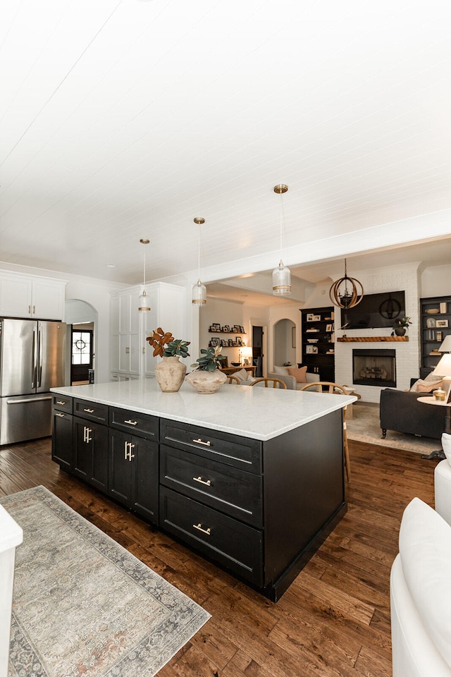 9405 Peppy Branch Trl, Apison, TN 37302 - kitchen with freestanding refrigerator, open floor plan, and dark cabinetry