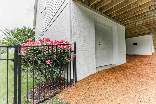 9405 Peppy Branch Trl, Apison, TN 37302 - view of outbuilding with a garage, fence, and a carport