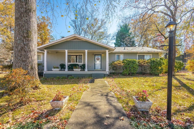 1616 Crappie Cir, Soddy Daisy, TN 37379 - view of front facade with covered porch and a front lawn