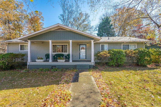 1616 Crappie Cir, Soddy Daisy, TN 37379 - view of front of home featuring a porch and a front yard