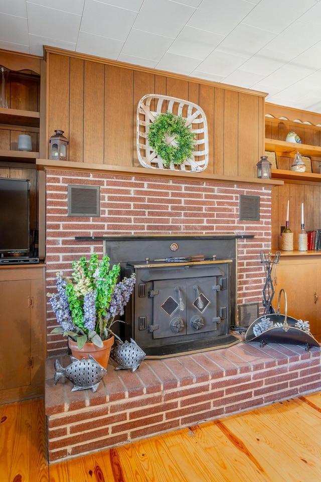 1616 Crappie Cir, Soddy Daisy, TN 37379 - living area with a fireplace and wooden walls