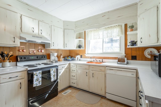 1616 Crappie Cir, Soddy Daisy, TN 37379 - kitchen featuring electric stove, white dishwasher, under cabinet range hood, open shelves, and wood walls