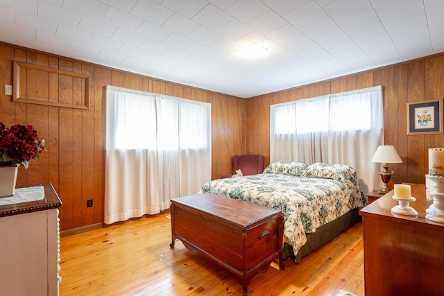 1616 Crappie Cir, Soddy Daisy, TN 37379 - bedroom featuring wooden walls and light wood finished floors