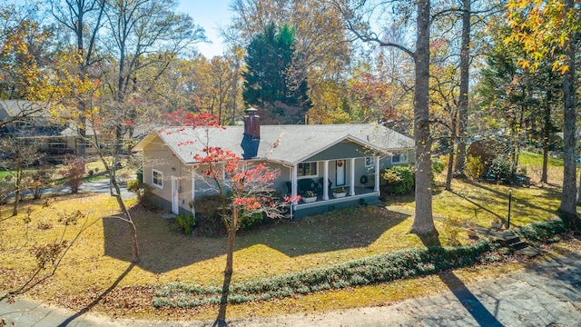 1616 Crappie Cir, Soddy Daisy, TN 37379 - bungalow-style house featuring a chimney and a front yard