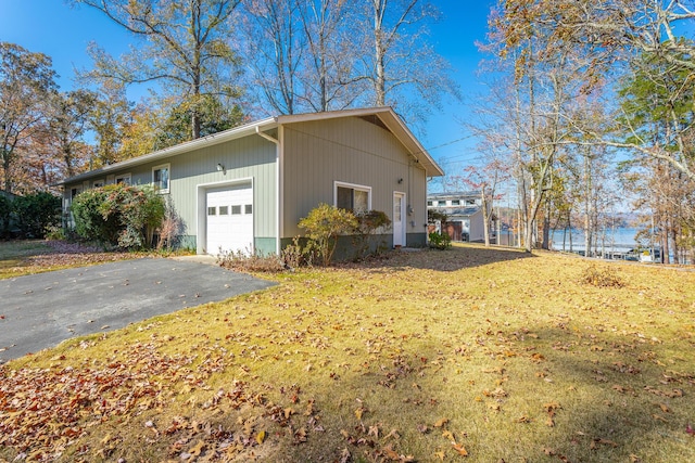 1616 Crappie Cir, Soddy Daisy, TN 37379 - view of home's exterior featuring driveway and a yard