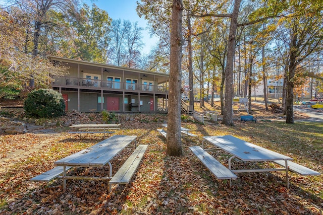 1616 Crappie Cir, Soddy Daisy, TN 37379 - rear view of property featuring stairs, ceiling fan, and a wooden deck