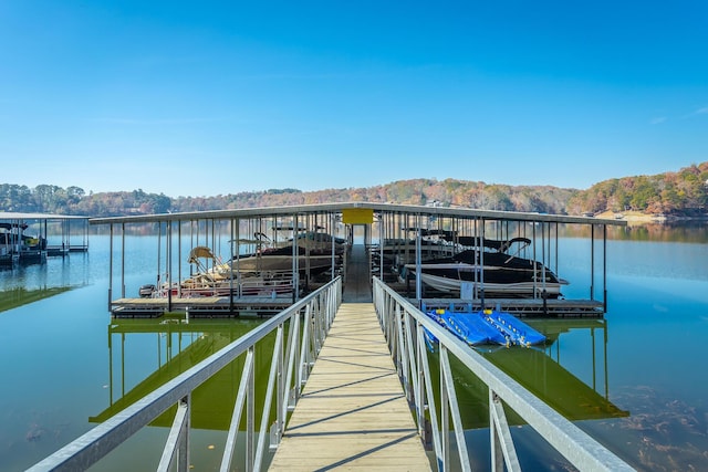 1616 Crappie Cir, Soddy Daisy, TN 37379 - dock area featuring a water view and a wooded view