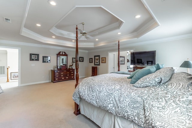 bedroom featuring light carpet, crown molding, baseboards, a tray ceiling, and recessed lighting