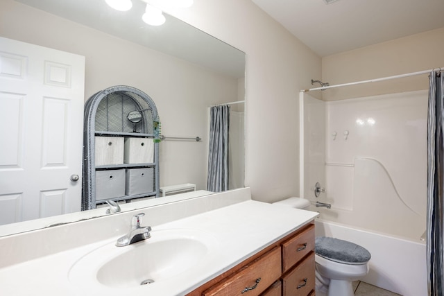 bathroom featuring toilet, vanity, and shower / bath combo with shower curtain