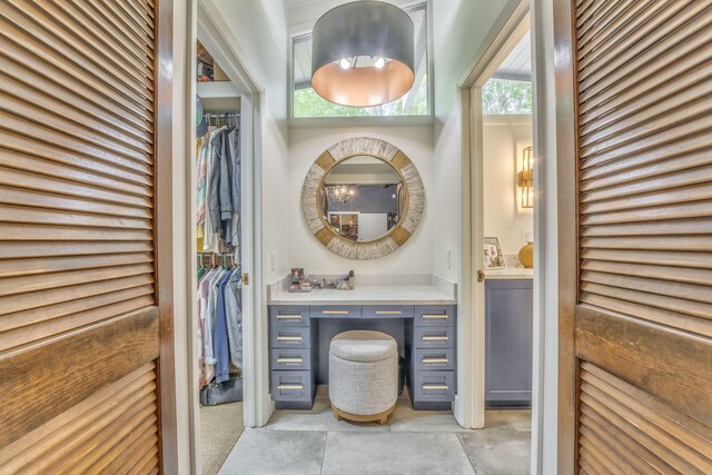 1301 W Morton Dr, Dalton, GA 30720 - bathroom featuring vanity and a walk in closet
