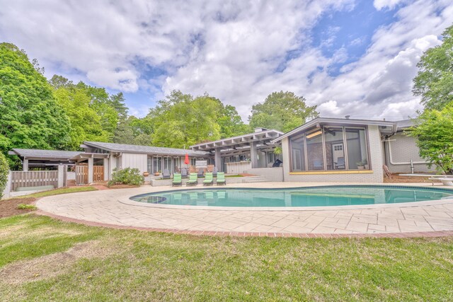1301 W Morton Dr, Dalton, GA 30720 - swimming pool featuring a sunroom, a patio area, and a ceiling fan