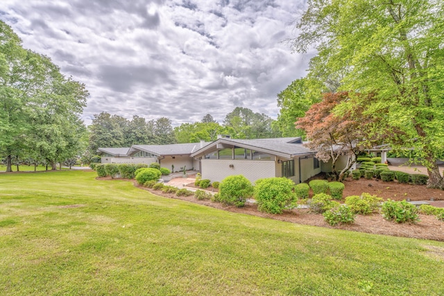 1301 W Morton Dr, Dalton, GA 30720 - view of home's exterior featuring a yard