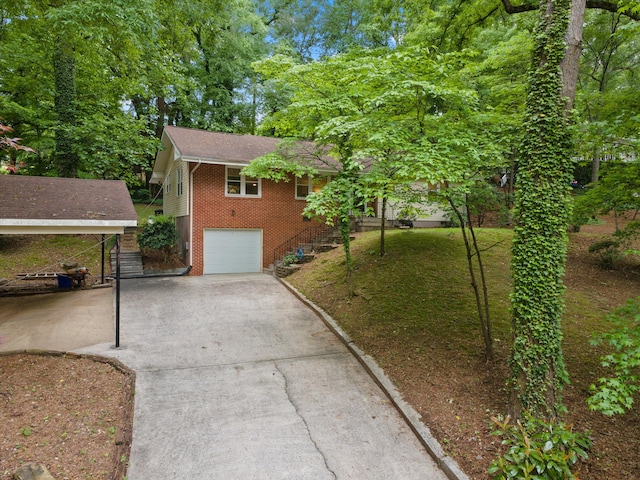 1123 Ridgeleigh Cir, Dalton, GA 30720 - view of side of property featuring brick siding, driveway, and a garage