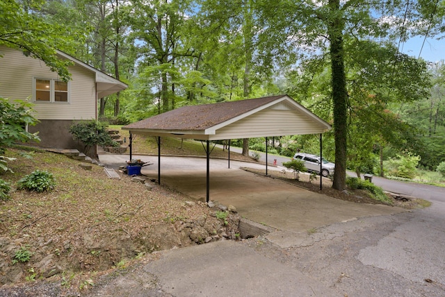 1123 Ridgeleigh Cir, Dalton, GA 30720 - view of home's community featuring a carport, driveway, and view of wooded area