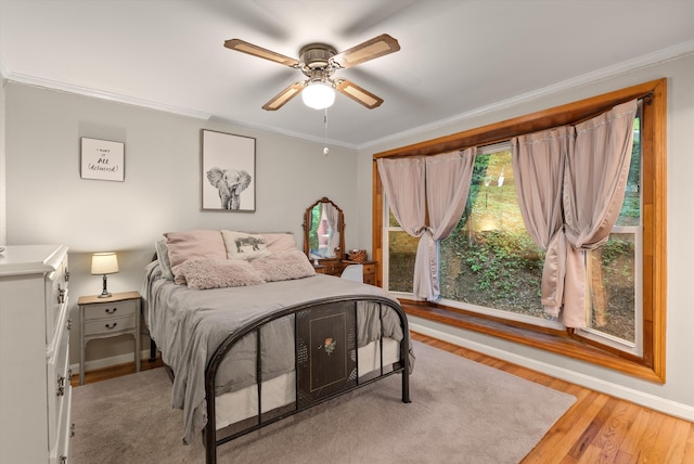 1123 Ridgeleigh Cir, Dalton, GA 30720 - bedroom with crown molding, wood finished floors, baseboards, and ceiling fan