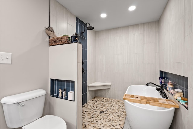 1123 Ridgeleigh Cir, Dalton, GA 30720 - bathroom featuring tiled shower, toilet, a freestanding tub, tile walls, and recessed lighting