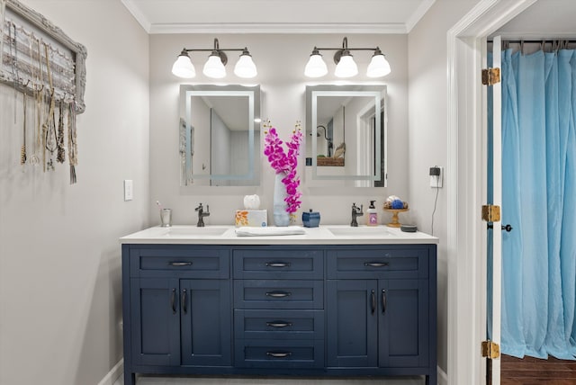 1123 Ridgeleigh Cir, Dalton, GA 30720 - bathroom featuring ornamental molding, double vanity, baseboards, and wood finished floors