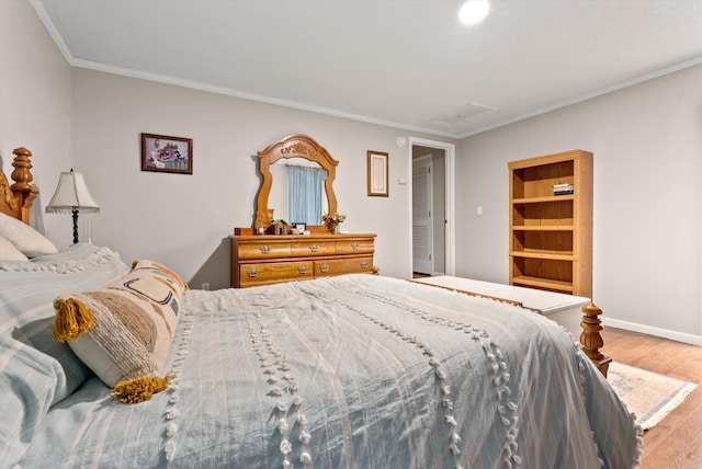 1123 Ridgeleigh Cir, Dalton, GA 30720 - bedroom featuring light wood-style flooring, attic access, ornamental molding, and baseboards