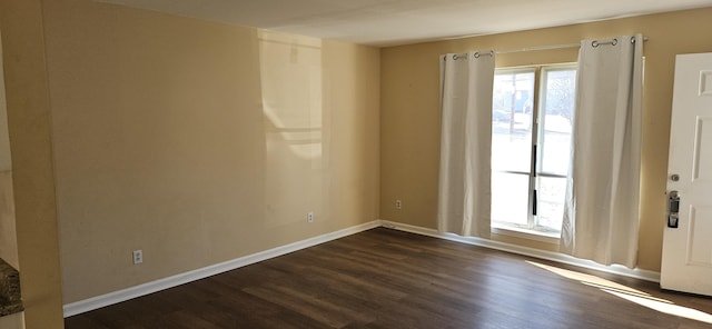 4458 Norcross Rd, Hixson, TN 37343 - empty room featuring dark wood-style flooring and baseboards