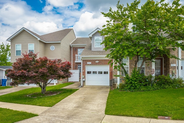 7817 Legacy Park Ct, Chattanooga, TN 37421 - view of front of home with a garage, a front yard, concrete driveway, a shingled roof, and brick siding