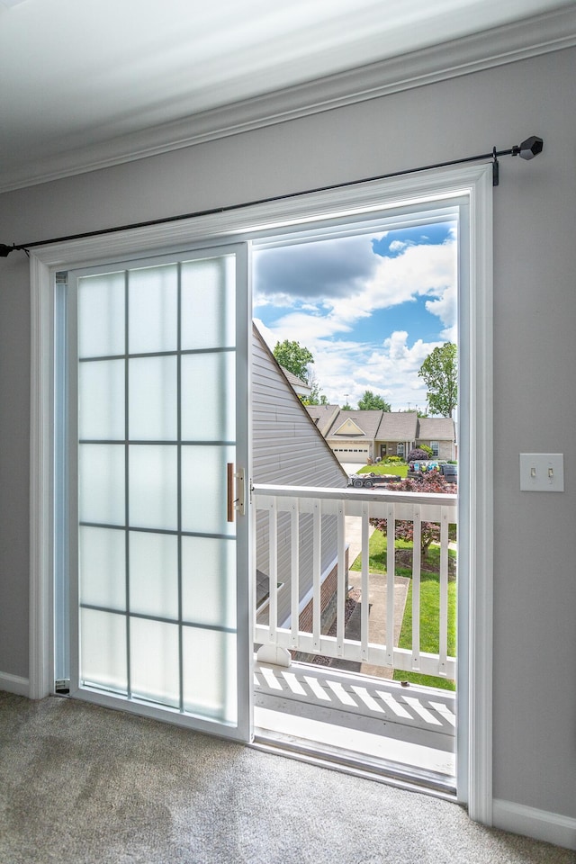 7817 Legacy Park Ct, Chattanooga, TN 37421 - doorway to outside with crown molding, carpet, and baseboards