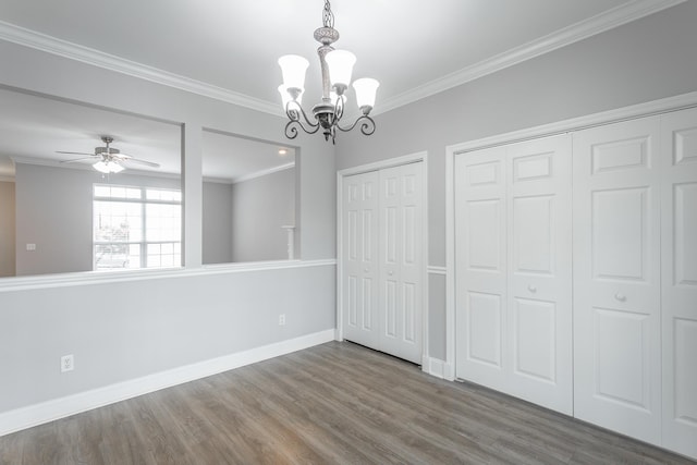 7817 Legacy Park Ct, Chattanooga, TN 37421 - unfurnished dining area featuring ornamental molding, wood finished floors, a chandelier, ceiling fan, and baseboards