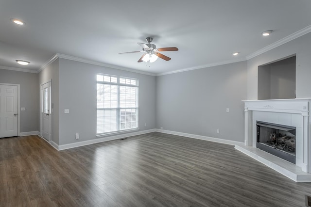 7817 Legacy Park Ct, Chattanooga, TN 37421 - unfurnished living room with a ceiling fan, dark wood finished floors, a tiled fireplace, baseboards, and ornamental molding