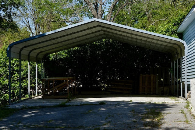 708 8th St, Bridgeport, AL 35740 - view of parking / parking lot featuring a detached carport
