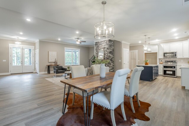 11570 Armstrong Rd, Soddy Daisy, TN 37379 - dining area featuring crown molding, ceiling fan, light wood-type flooring, recessed lighting, and baseboards