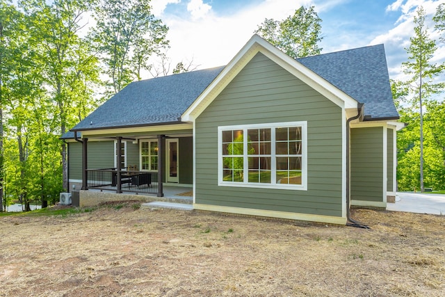 11570 Armstrong Rd, Soddy Daisy, TN 37379 - rear view of house featuring roof with shingles and a patio area