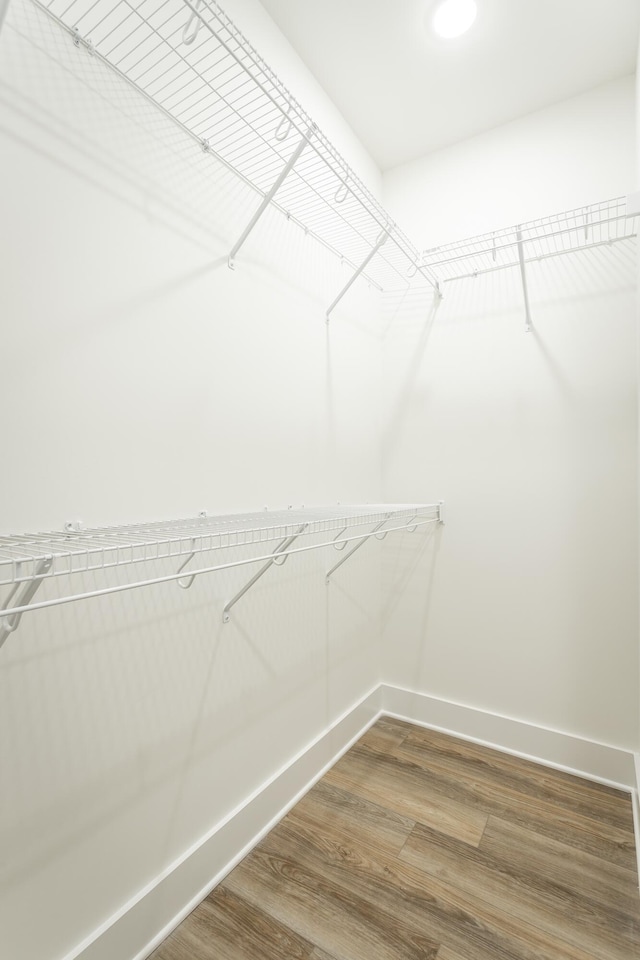 11570 Armstrong Rd, Soddy Daisy, TN 37379 - spacious closet featuring wood finished floors