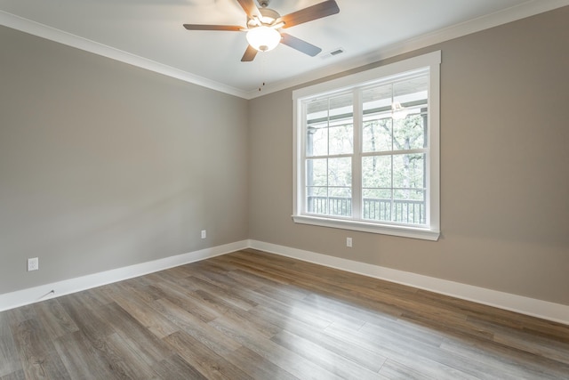 11570 Armstrong Rd, Soddy Daisy, TN 37379 - spare room featuring ornamental molding, baseboards, wood finished floors, and a ceiling fan