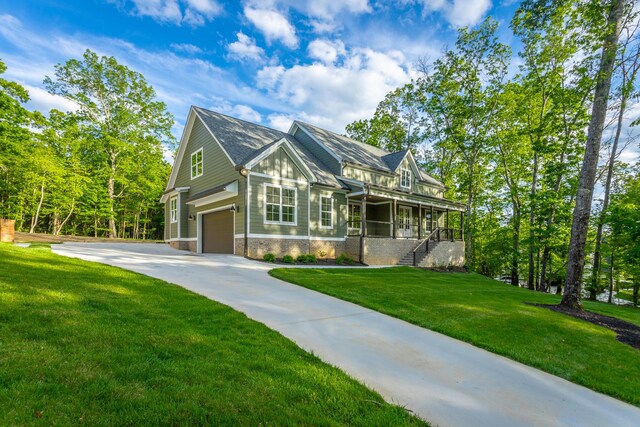 11570 Armstrong Rd, Soddy Daisy, TN 37379 - view of front facade featuring an attached garage, driveway, a front lawn, a porch, and stairway