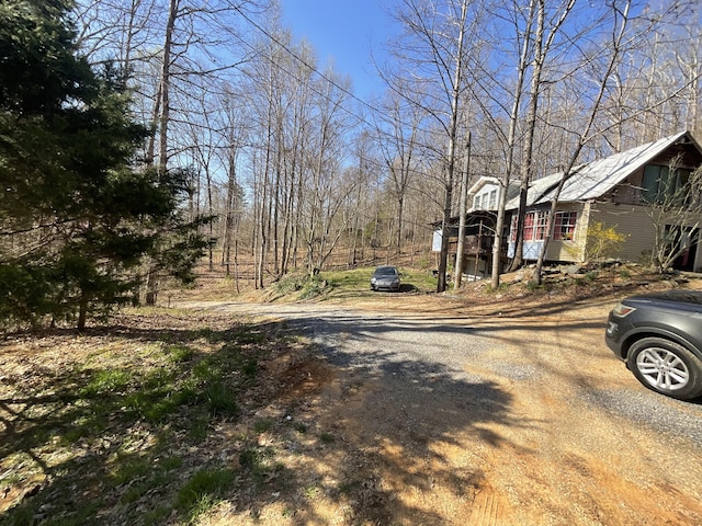 view of dirt / gravel driveway