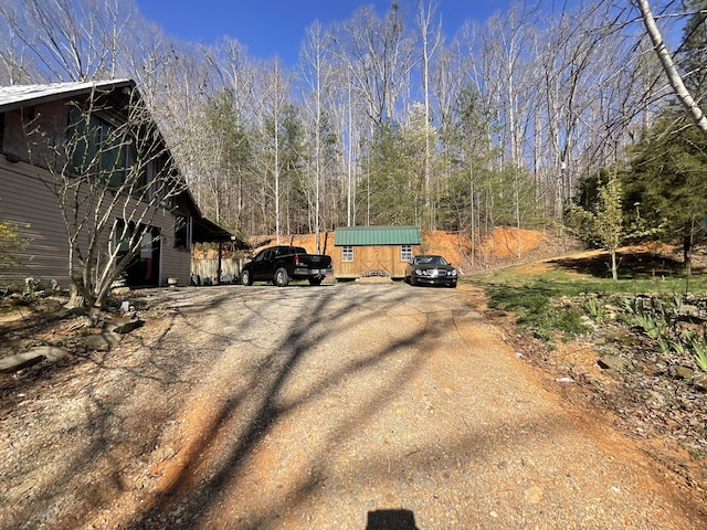 view of dirt / gravel driveway
