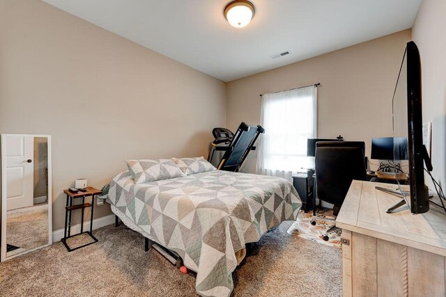 231 Winchester Dr, Rossville, GA 30741 - carpeted bedroom with baseboards and an office area