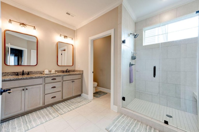 231 Winchester Dr, Rossville, GA 30741 - bathroom featuring toilet, a shower stall, crown molding, double vanity, and tile patterned flooring