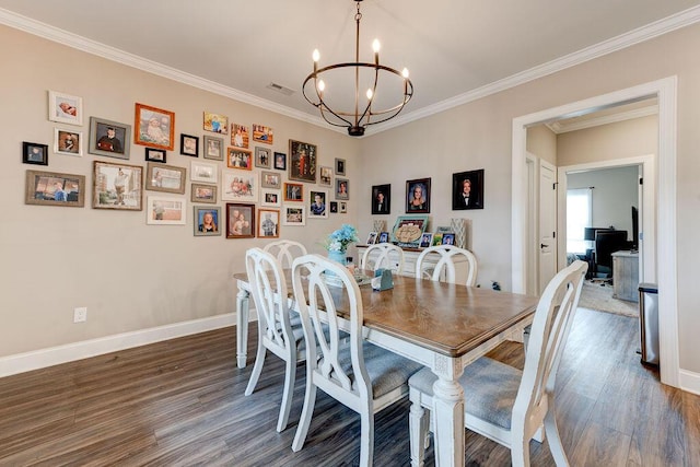 231 Winchester Dr, Rossville, GA 30741 - dining area featuring a chandelier, wood finished floors, ornamental molding, and baseboards